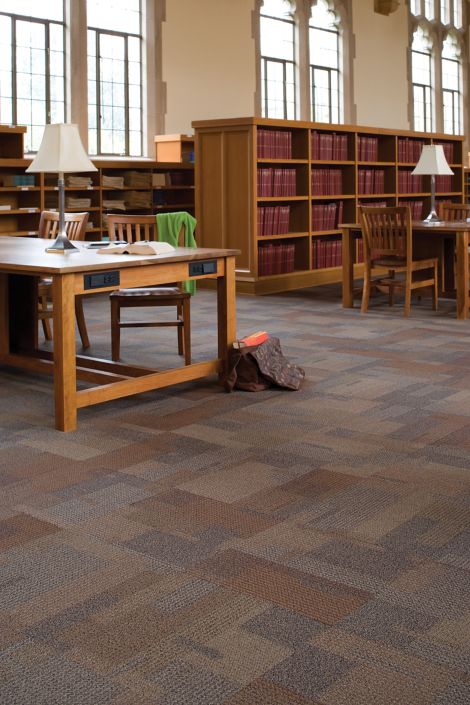 Interface Entropy carpet tile in library study area with lamp on table