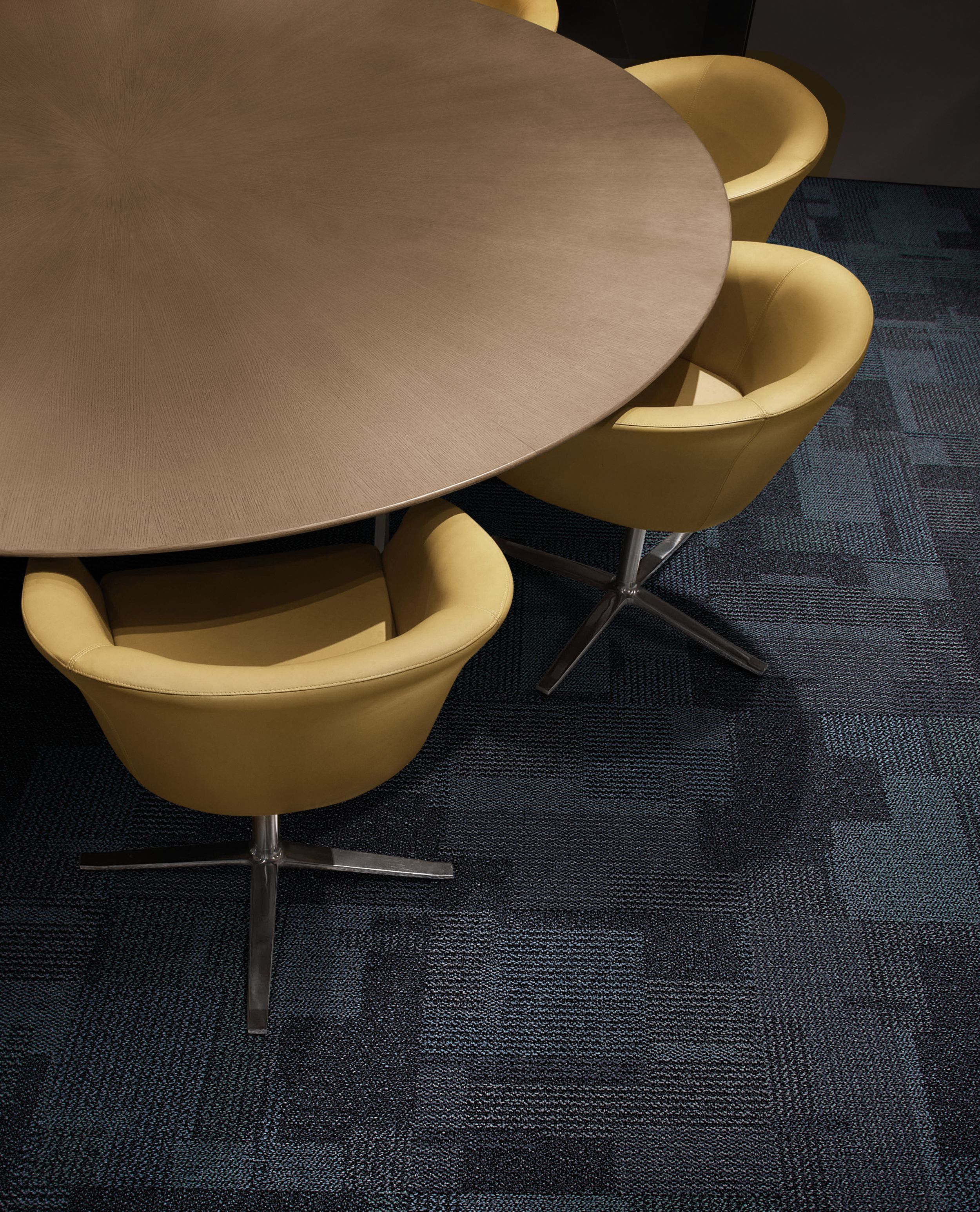 Interface Entropy carpet tile in meeting room with round wooden table and yellow chairs image number 1