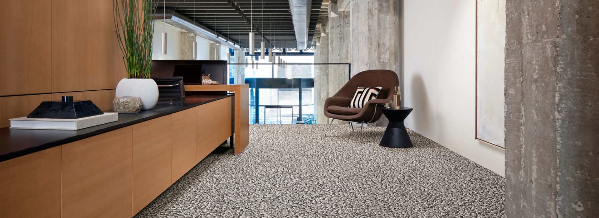 Interface E611 carpet tile in corridor with credenza and concrete column