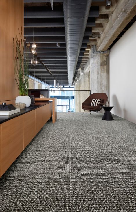 Interface E613 plank carpet tile in office corridor with credenza and small seating area image number 2