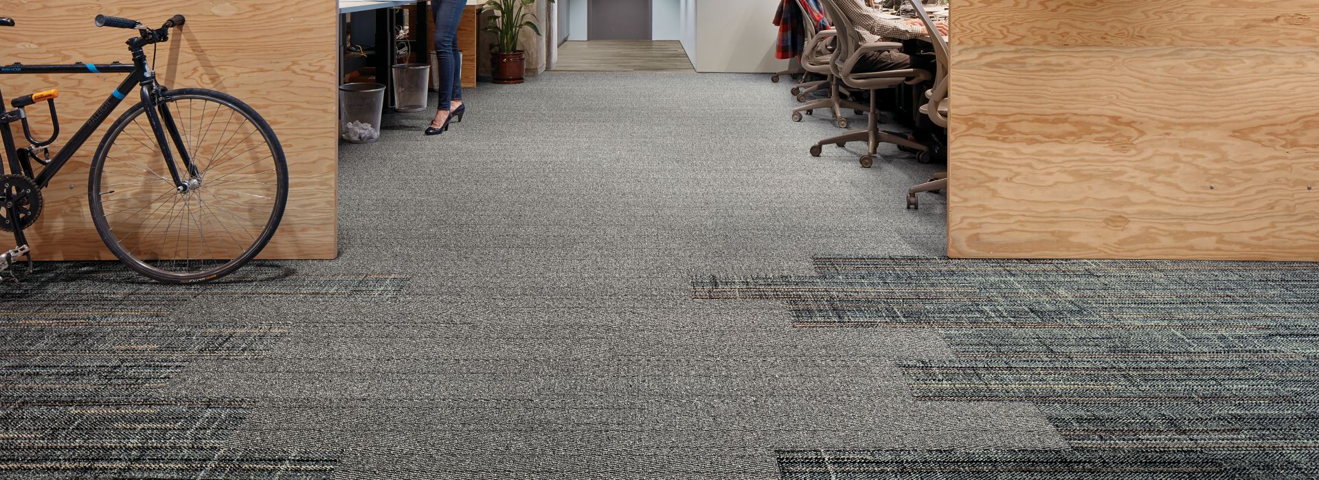 Interface French Seams and Stitch in Time plank carpet tile and Textured Woodgrains LVT with workstations