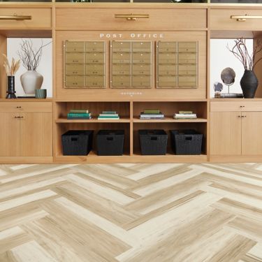 Interface Great Heights LVT in White Oak shown in a casual reception area imagen número 1