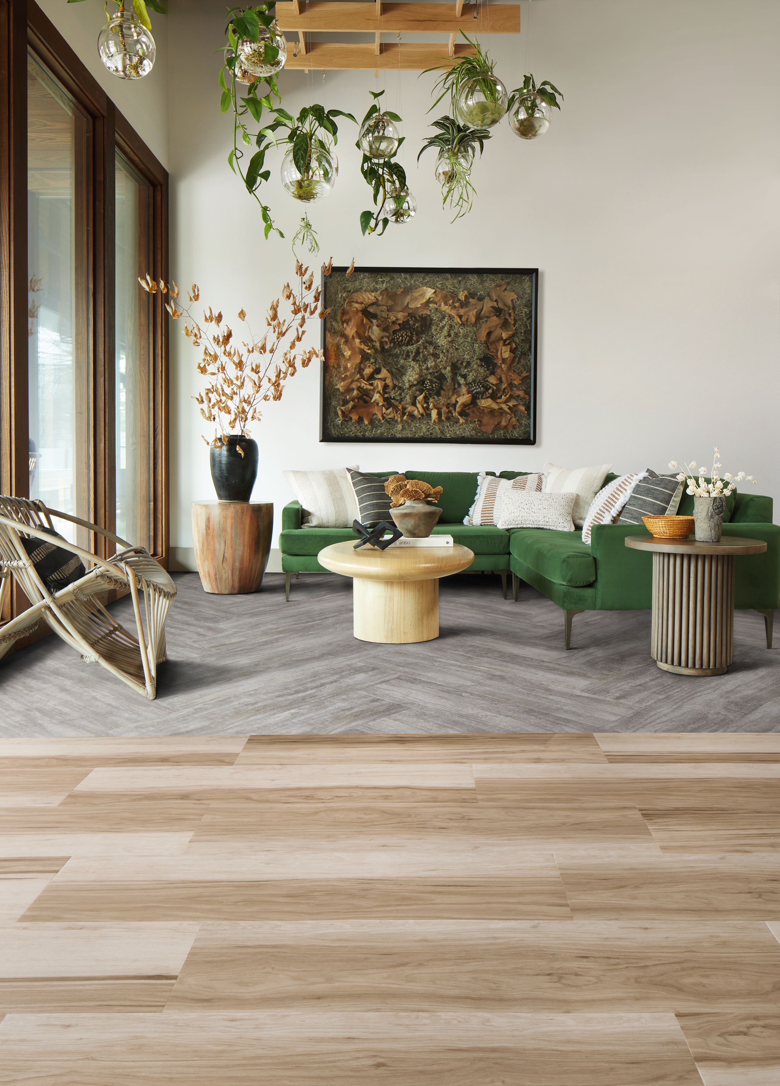 Interface Great Heights and Cliff LVT planks in seating area with green couch, plants and small wood table image number 2