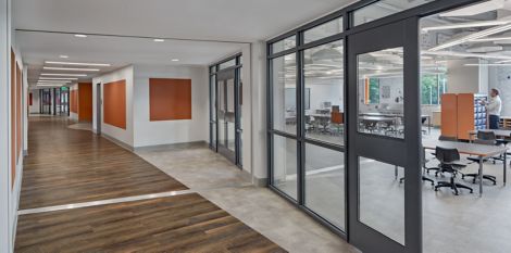 Interface Textured Stones and Natural Woodgrains LVT in office hallway setting  número de imagen 2