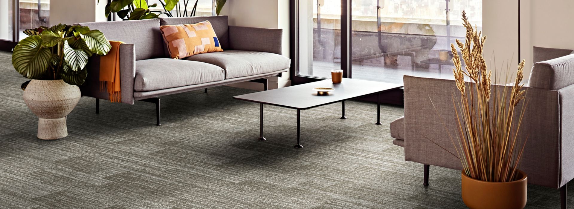 Interface Fringe Benefits plank carpet tile in workplace lobby