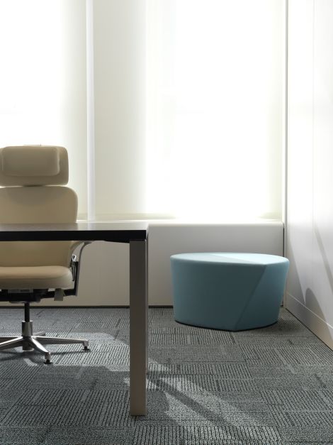 Interface Furrows II carpet tile in private office with desk and blue ottoman image number 4