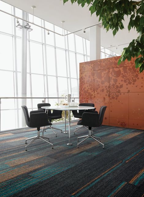 Interface Ground Waves, Harmonize and Ground Waves Verse plank carpet tile in open office meeting area with small table and chairs
