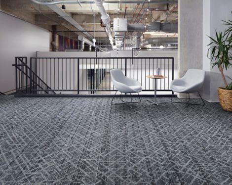 Interface Glisten plank carpet tile in seating area at stairwell with white chairs, small table and plant numéro d’image 3