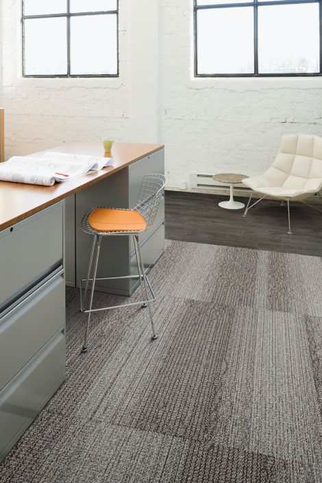 Interface Grasmere plank carpet tile and Natural Woodgrains LVT in desk area