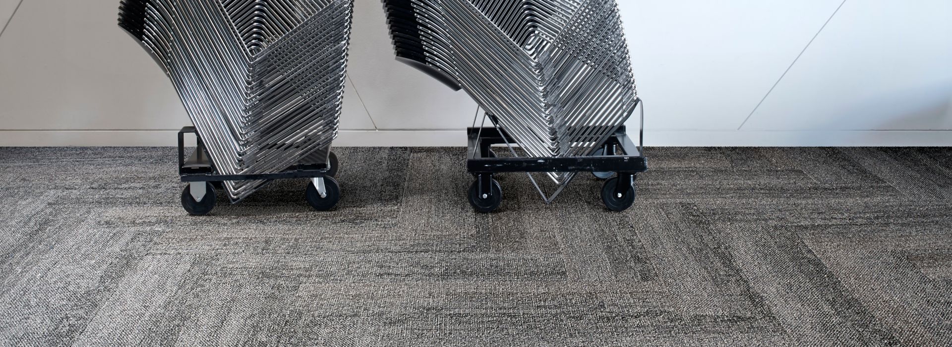 Interface HN820 plank carpet tile with folding chair stacks