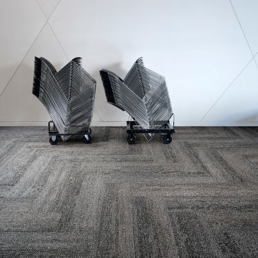 Interface HN820 plank carpet tile with folding chair stacks image number 1
