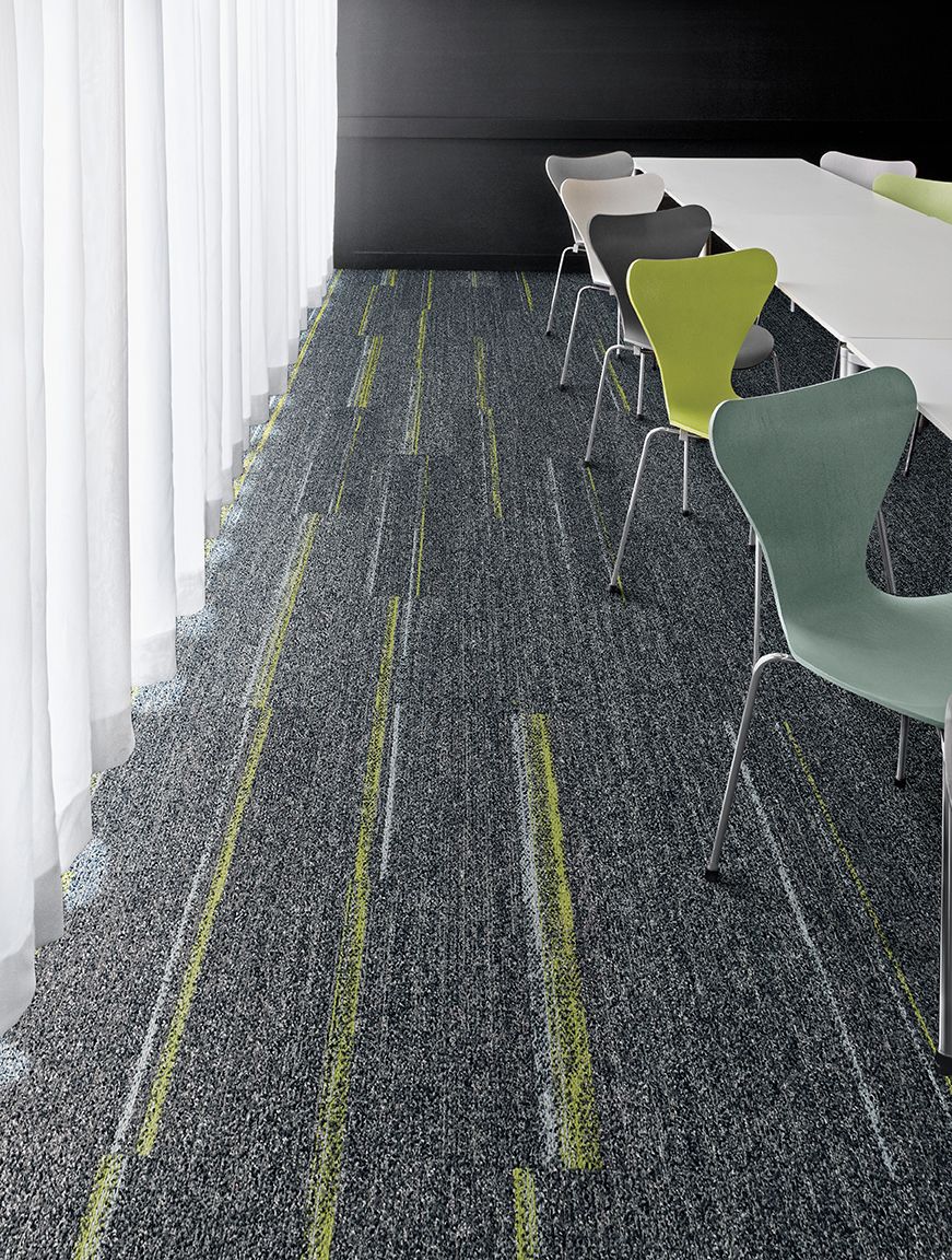 Interface Harmonize and Ground Waves plank carpet tile with multi-colored chairs at long table image number 12