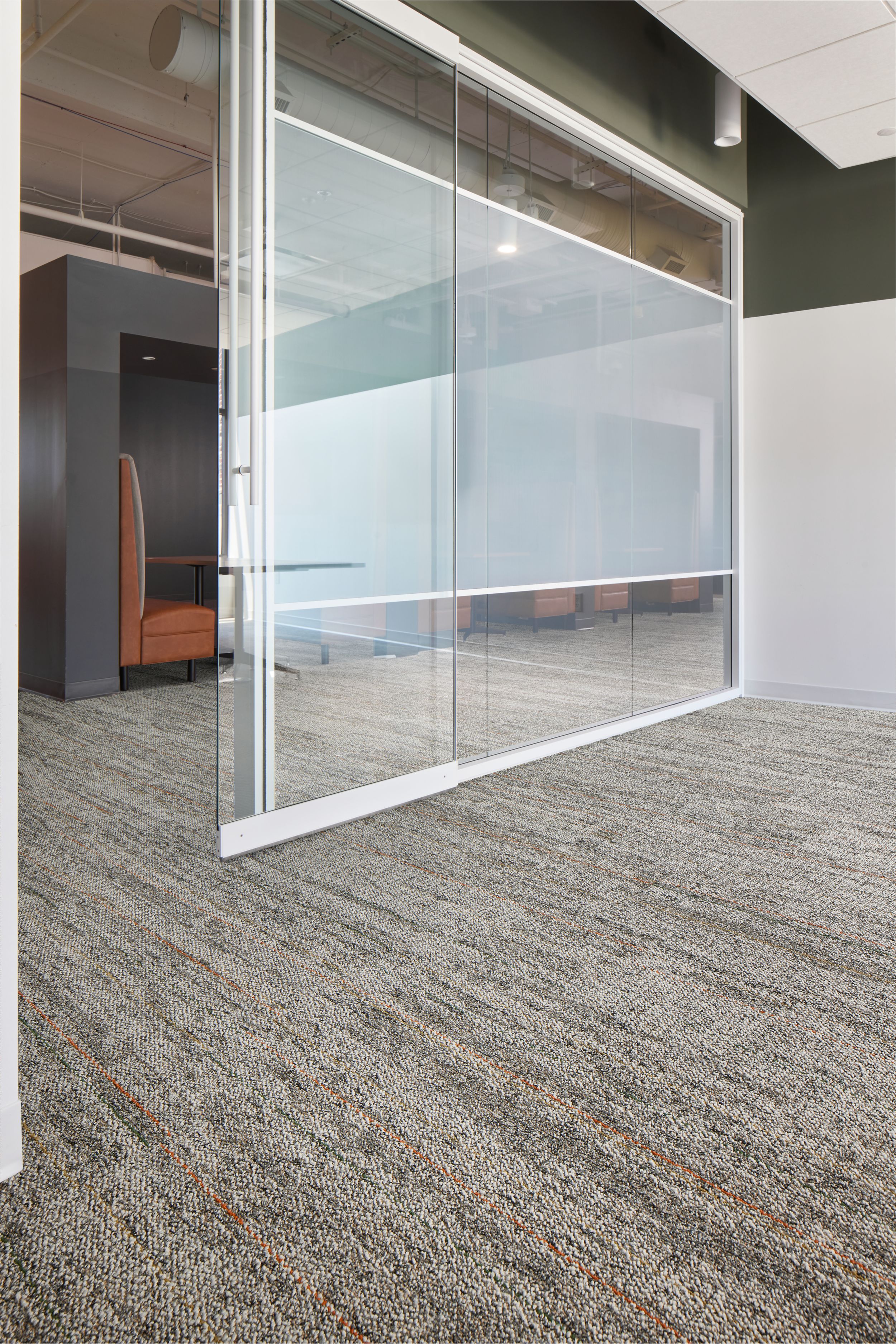 Interface Open Air 402 Stria carpet tile in office corridor under glass door image number 1