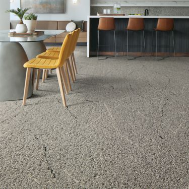 Interface Ribbon Rock carpet tile in open dining and seating area