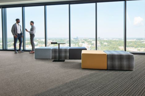 Interface Stitch in Time and WW865 carpet tile in open air lobby with full windows