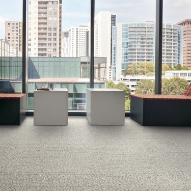 Interface Stitch in Time plank carpet tile with tables and chairs facing outside image number 1