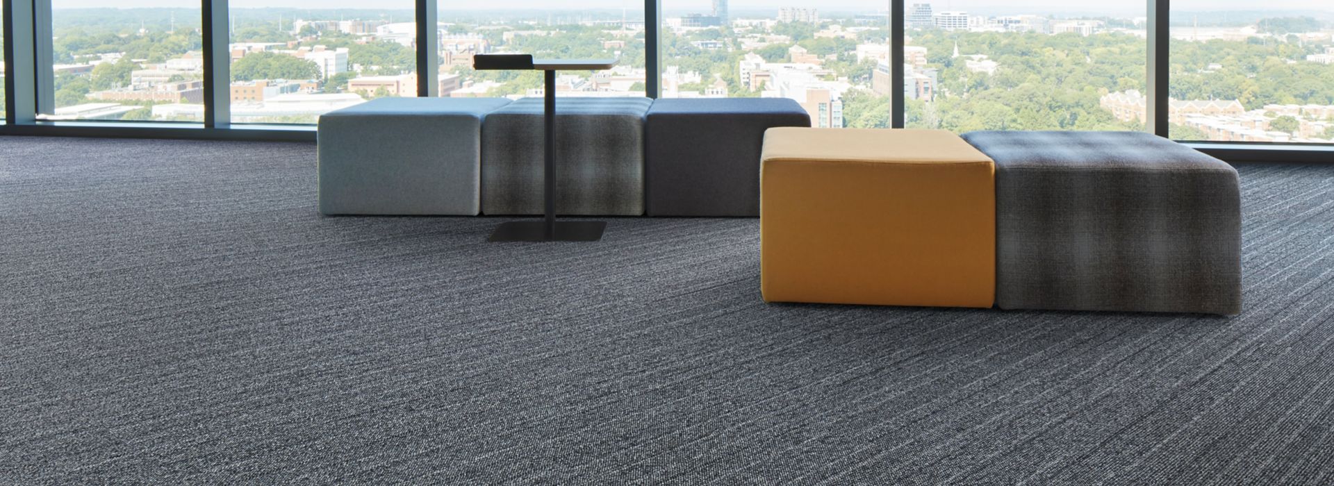Interface WW860 carpet tile in modern open air lobby