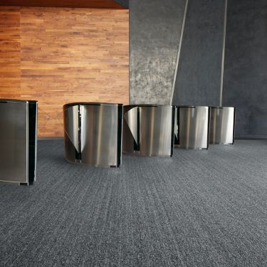 Interface WW860 carpet tile in auditorium entryway with turnstiles image number 1