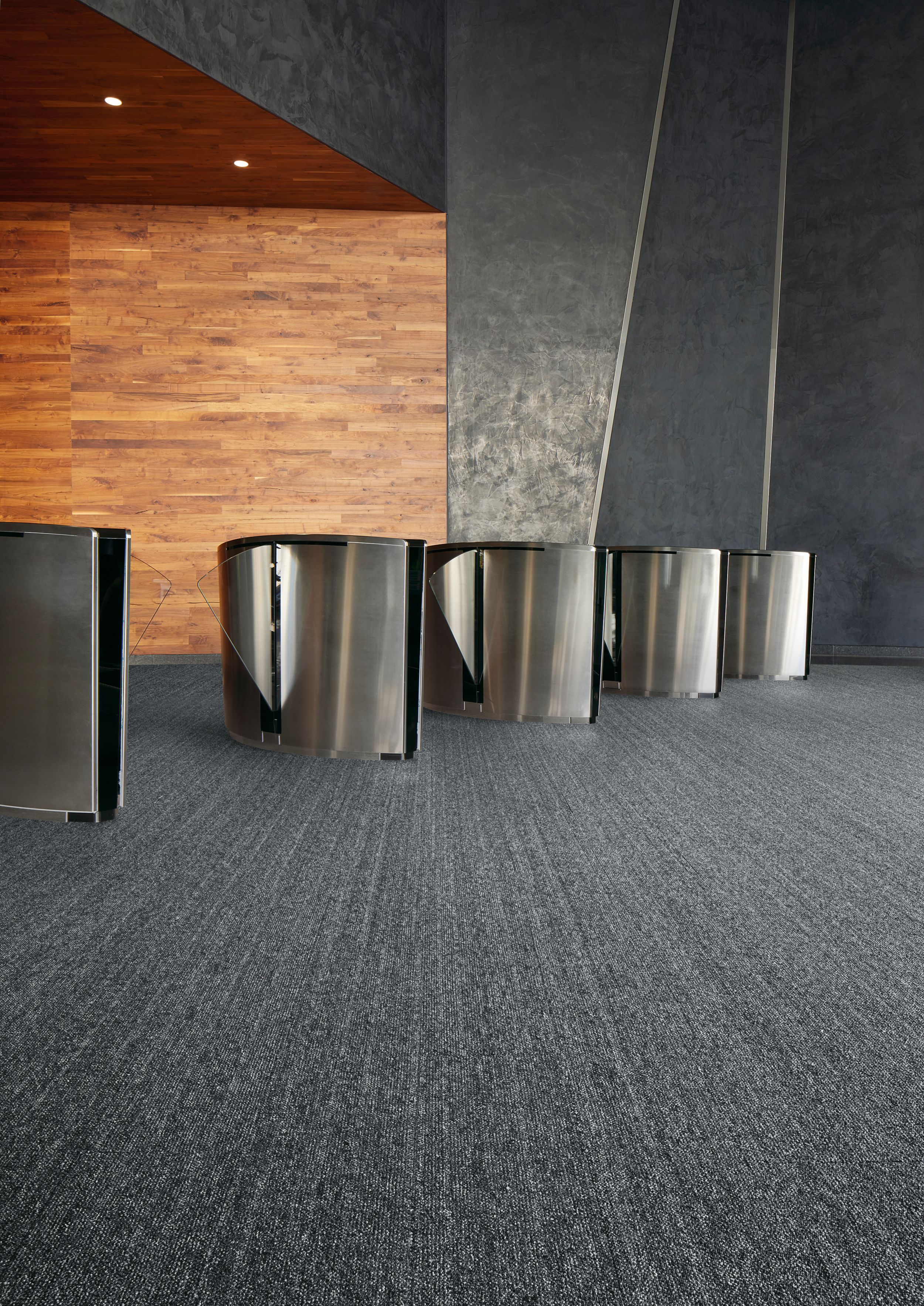 Interface WW860 carpet tile in auditorium entryway with turnstiles image number 1
