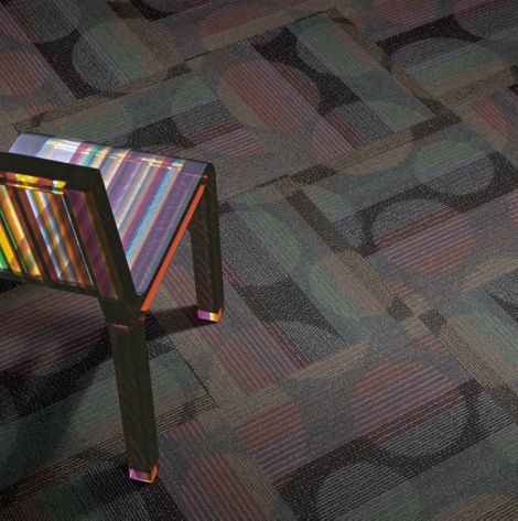 Detail of Interface Psychedelic carpet tile with chair