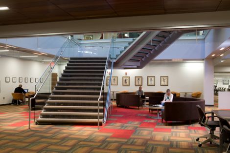 Interface Chenille Warp and Syncopation carpet tile in lobby of library with staircase