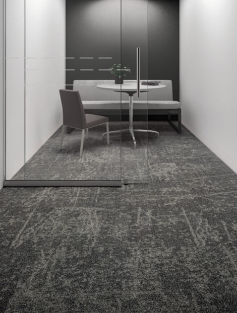 Interface Ice Breaker carpet tile in small conference room with glass door