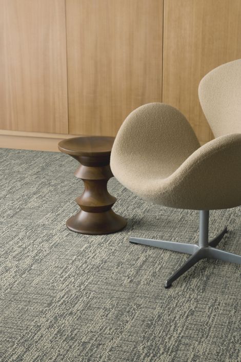 Interface Intermedio plank carpet tile in meeting room with four chairs and table