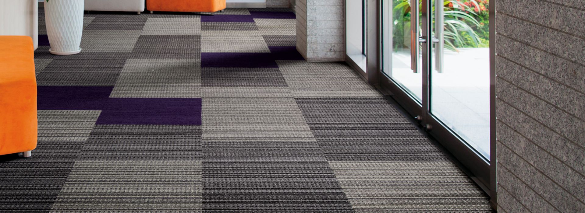 Interface La Paz and Viva Colores carpet tile in entrance area with plant and natural light
