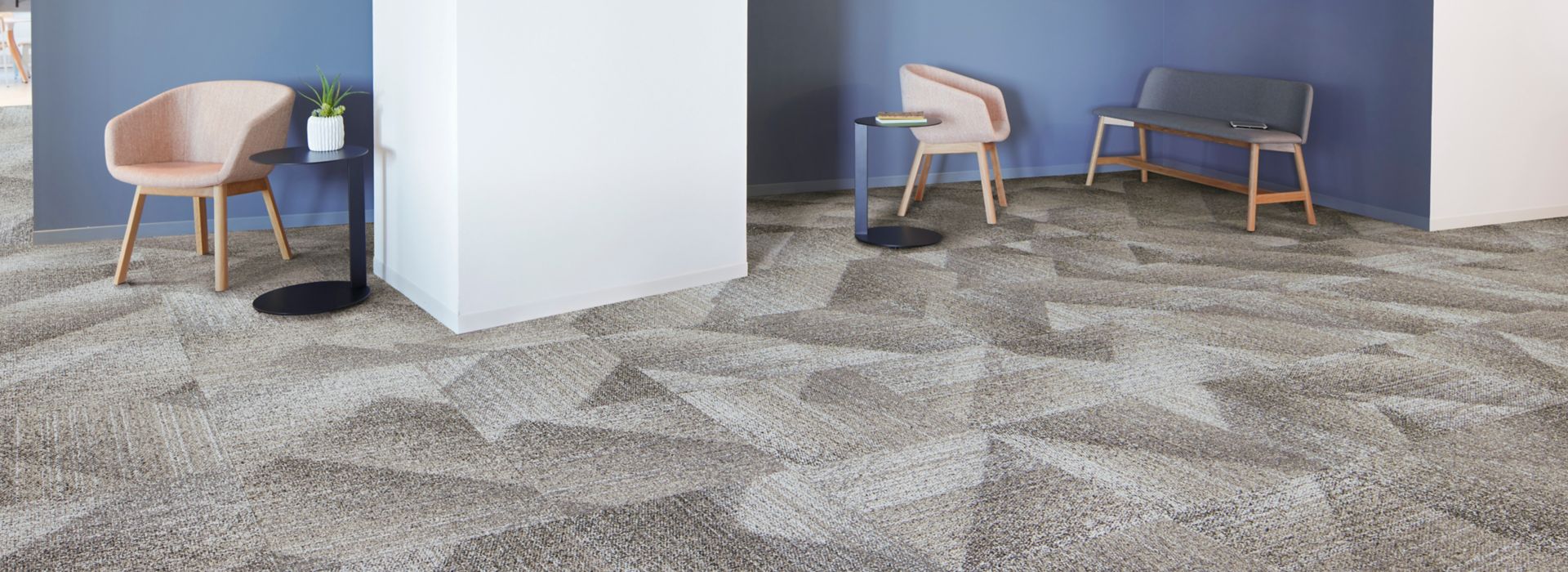 Interface Light Play carpet tile in open workspace area with seating