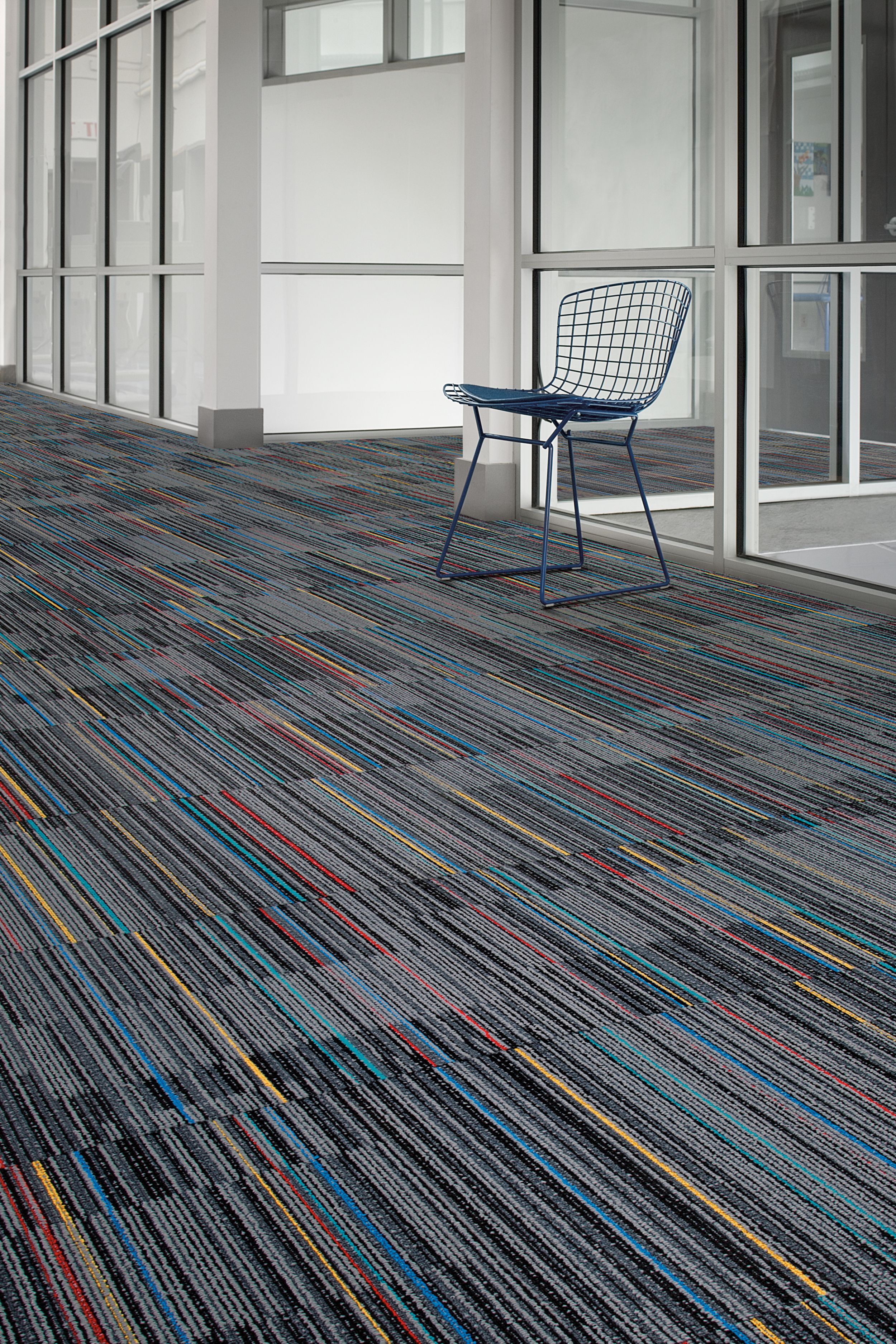 Interface Lima Colores carpet tile  in open corridor with single chair image number 1