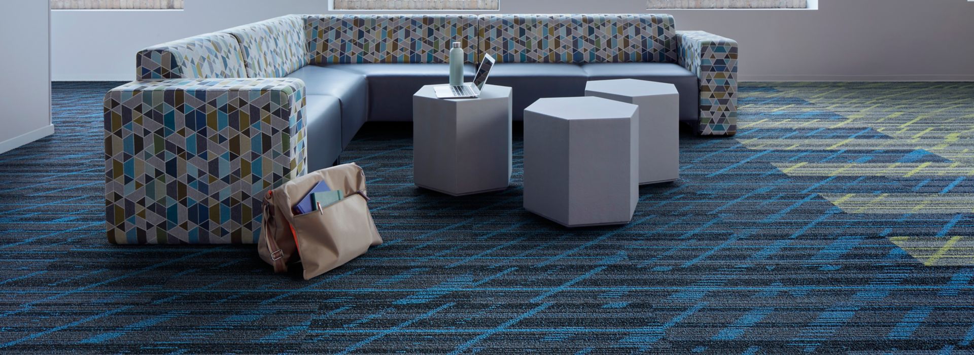 Interface Luminescent plank tile in seating area