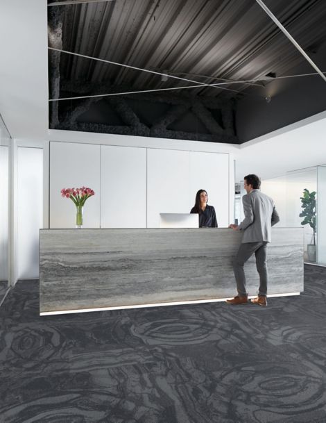 Interface Head Over Heels M1047 carpet tile in hotel reception area with man and woman talking image number 6