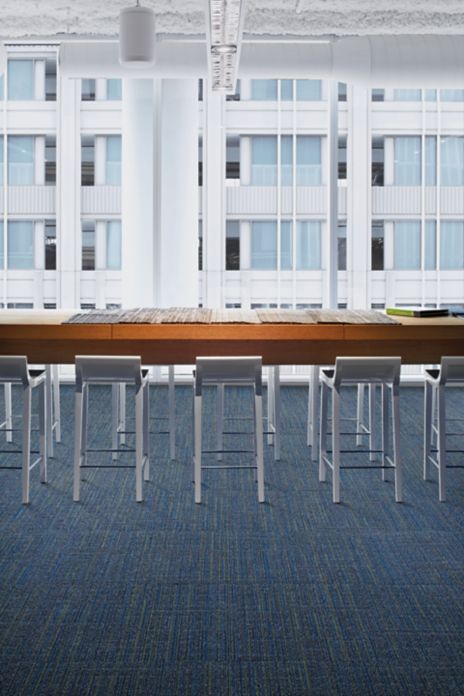 Interface Main Line carpet tile in meeting area with carpet tiles on table