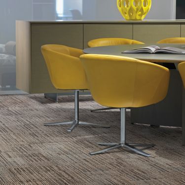 Interface Mantra carpet tile in seating area with round table and yellow chairs image number 1