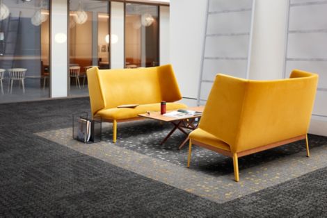 Interface Mercer Street and Broome Street carpet tile in seating area with two yellow couches image number 16
