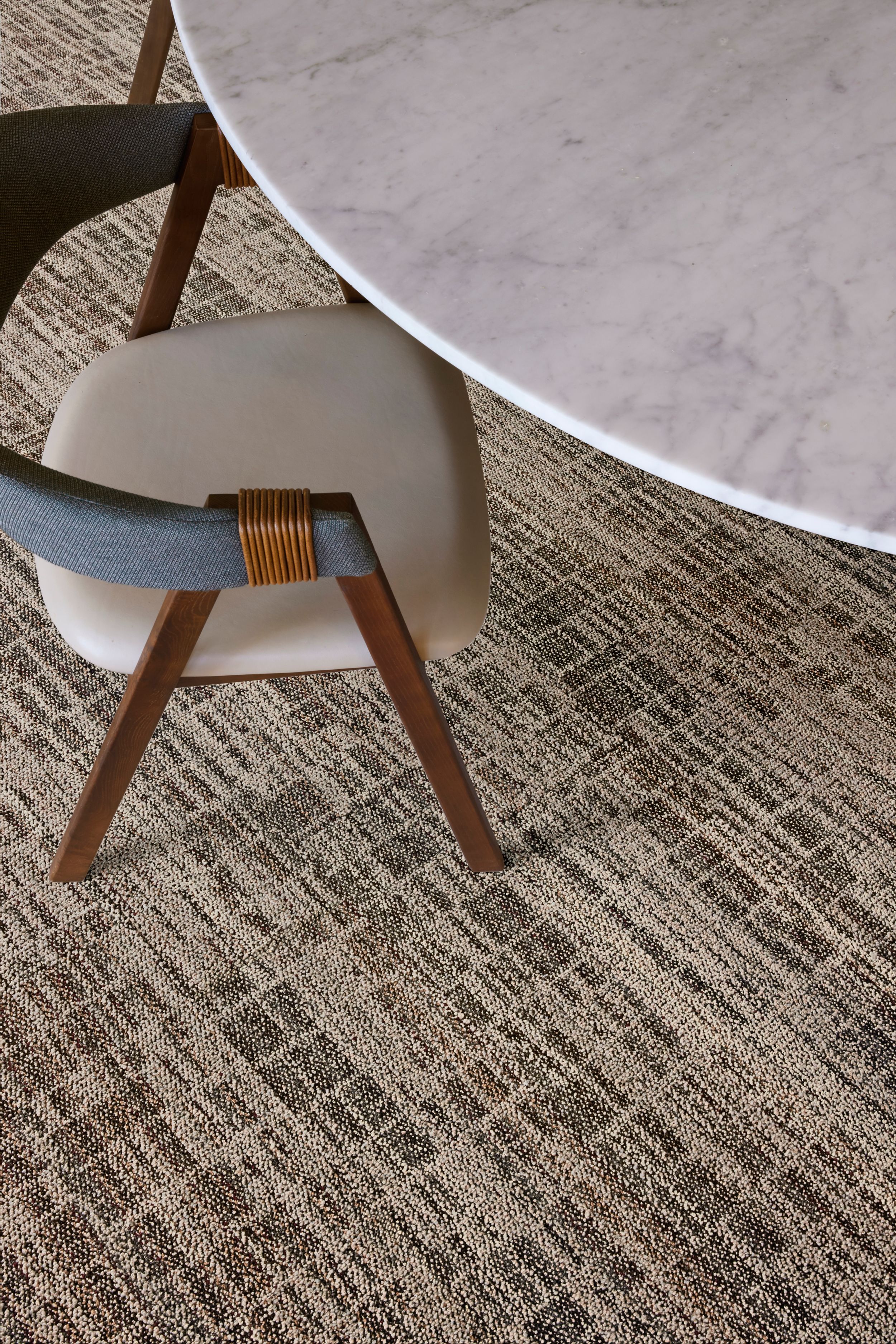 Interface Skylights plank carpet tile in close-up shot of table and chair image number 4