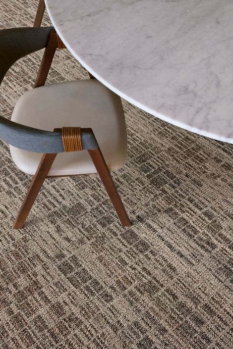 Interface Skylights plank carpet tile in close-up shot of table and chair image number 4