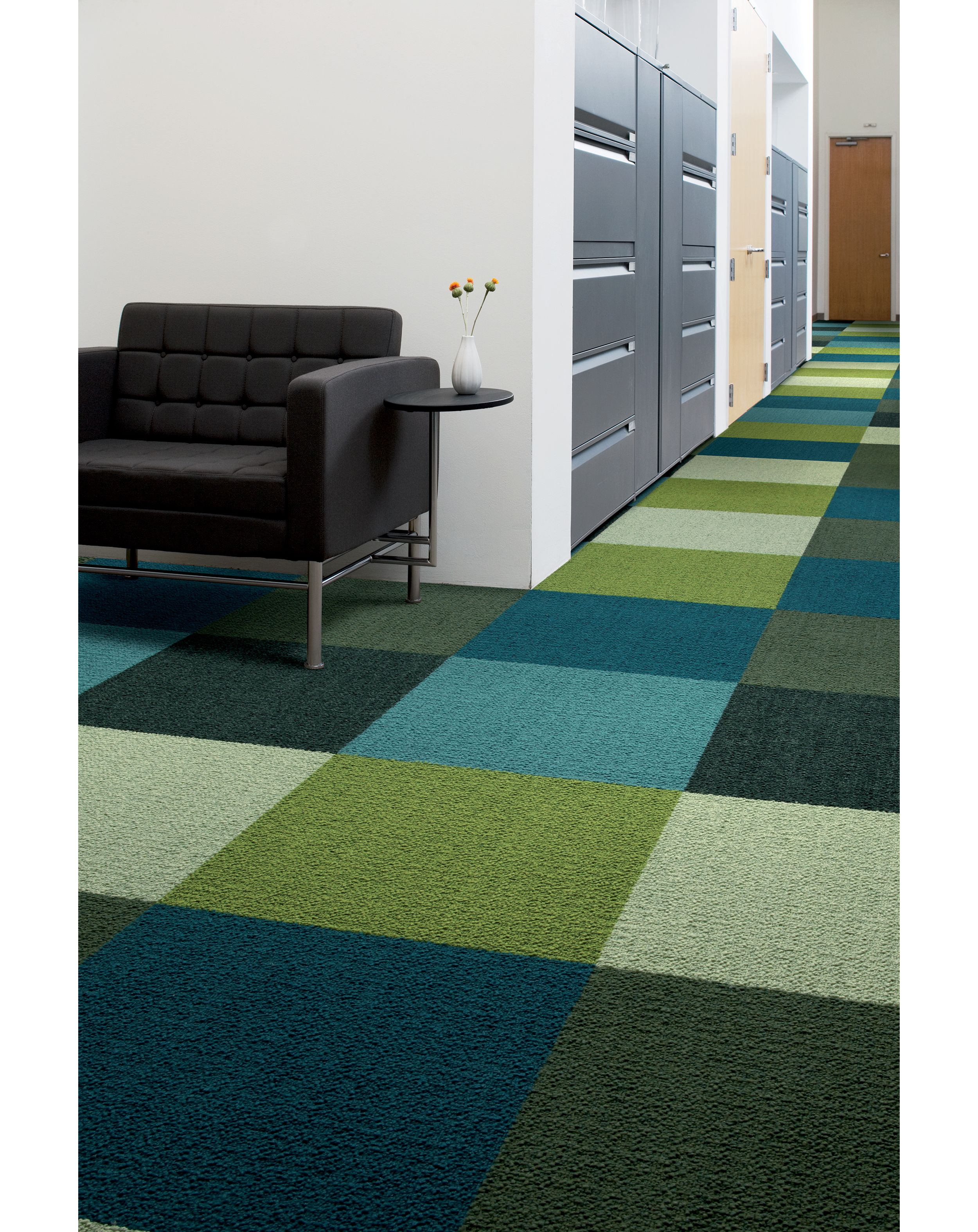 Interface Monochrome carpet tile in office corridor with black chair against wall image number 8