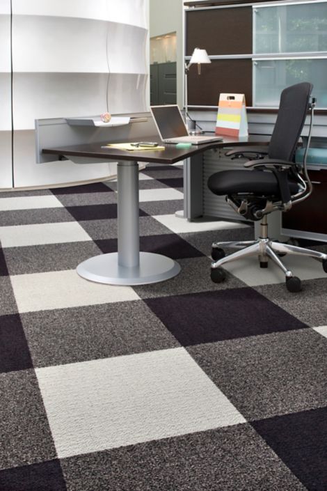 Interface Monochrome carpet tile in private workspace