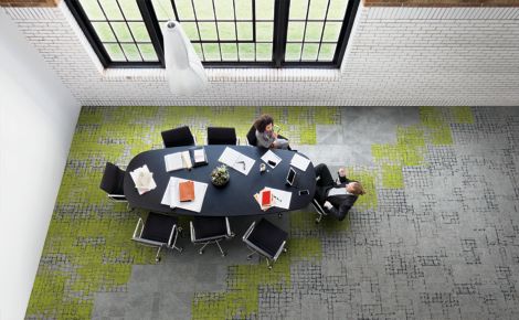 Interface Kerbstone, Moss, Moss in Stone, Paver, and Sett in Stone carpet tile in overhead view of meeting area with two people convsersating image number 4