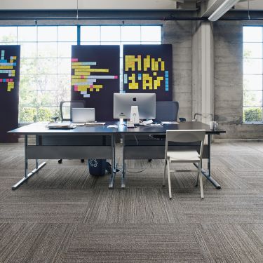 Interface NF400 plank carpet tile with a workstation image number 1