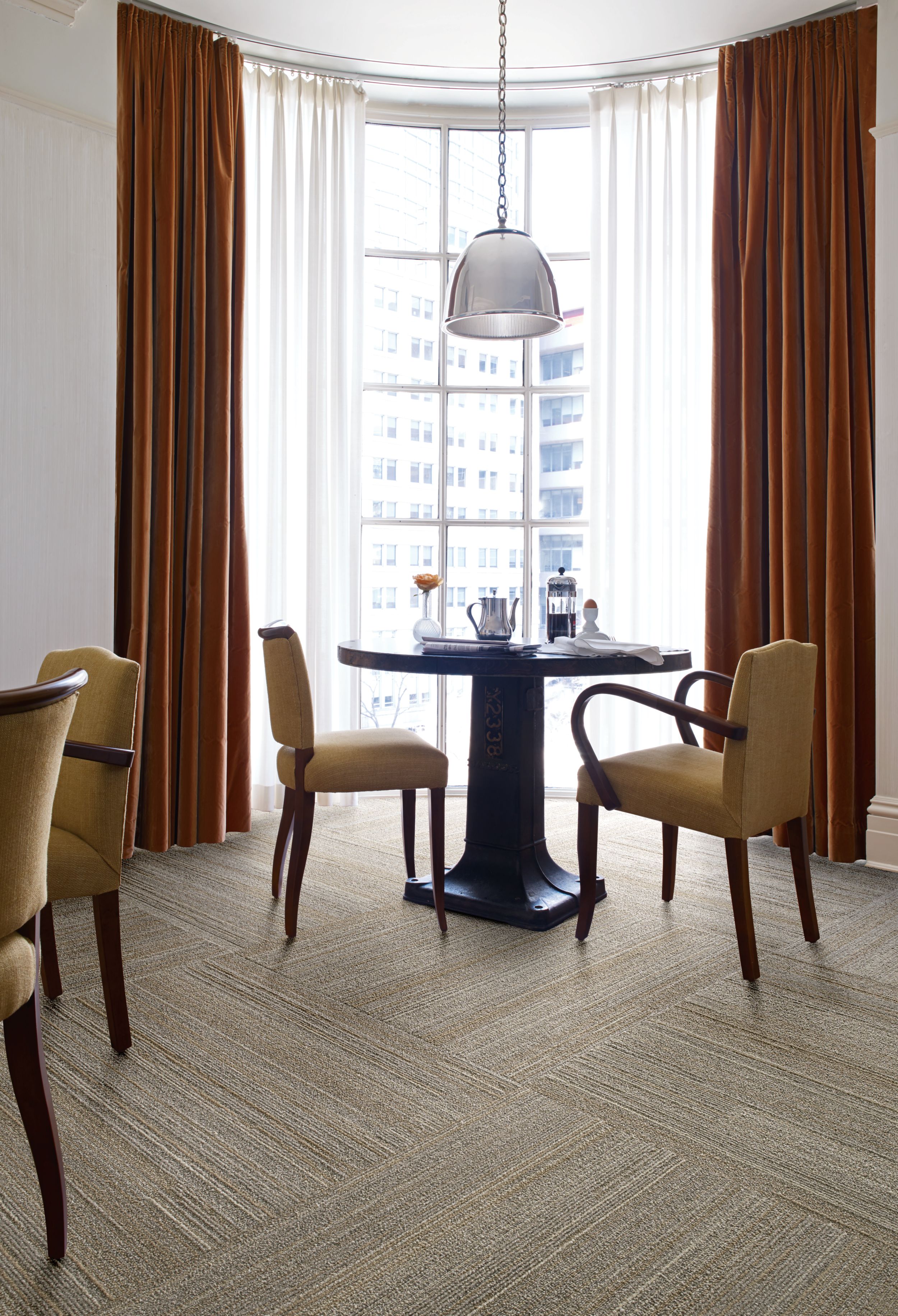 Interface NF400 plank carpet tile at small breakfast table in front of window image number 8