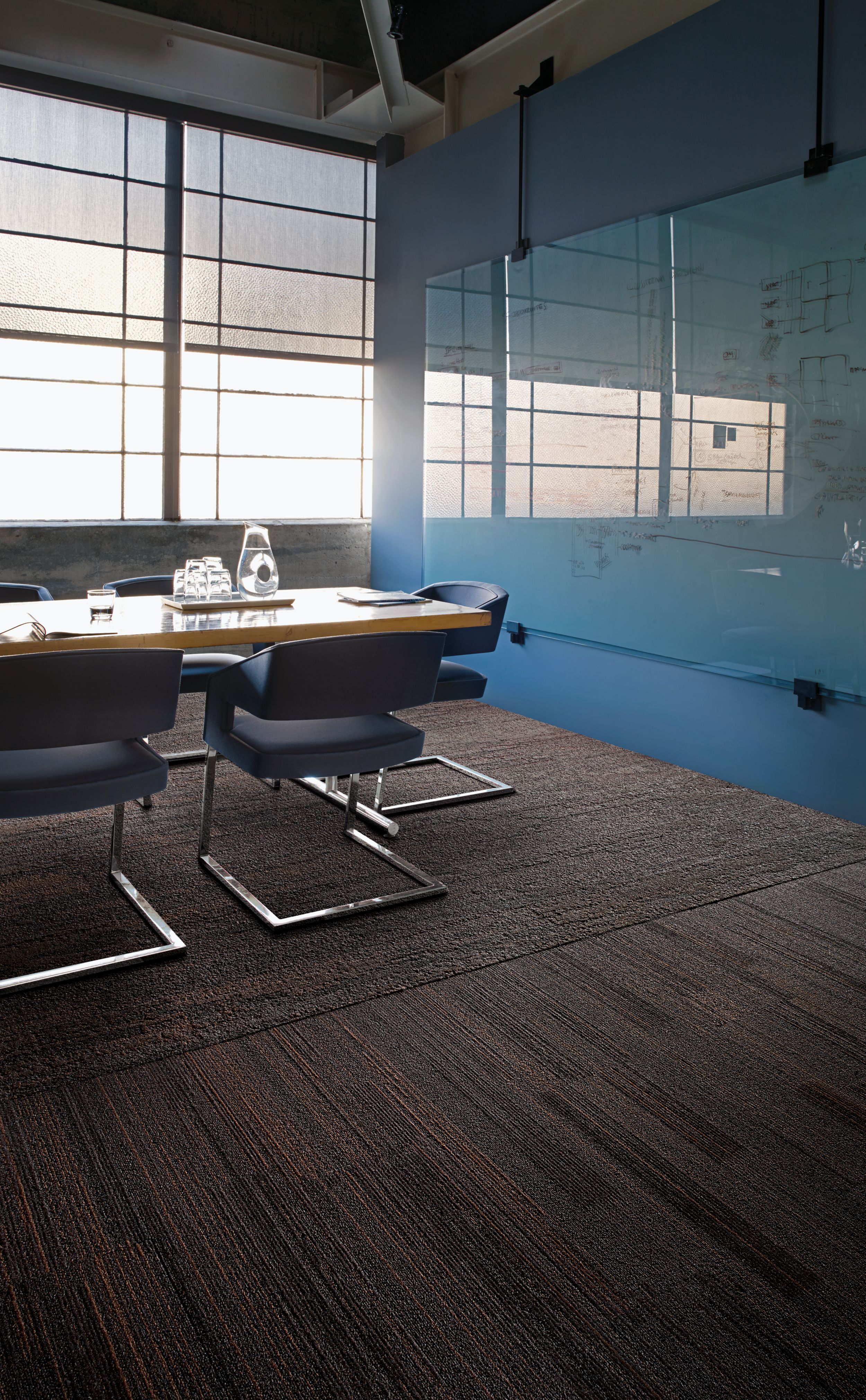 Interface NF400 and NF401 plank carpet tile in office meeting room with light shining through window image number 4