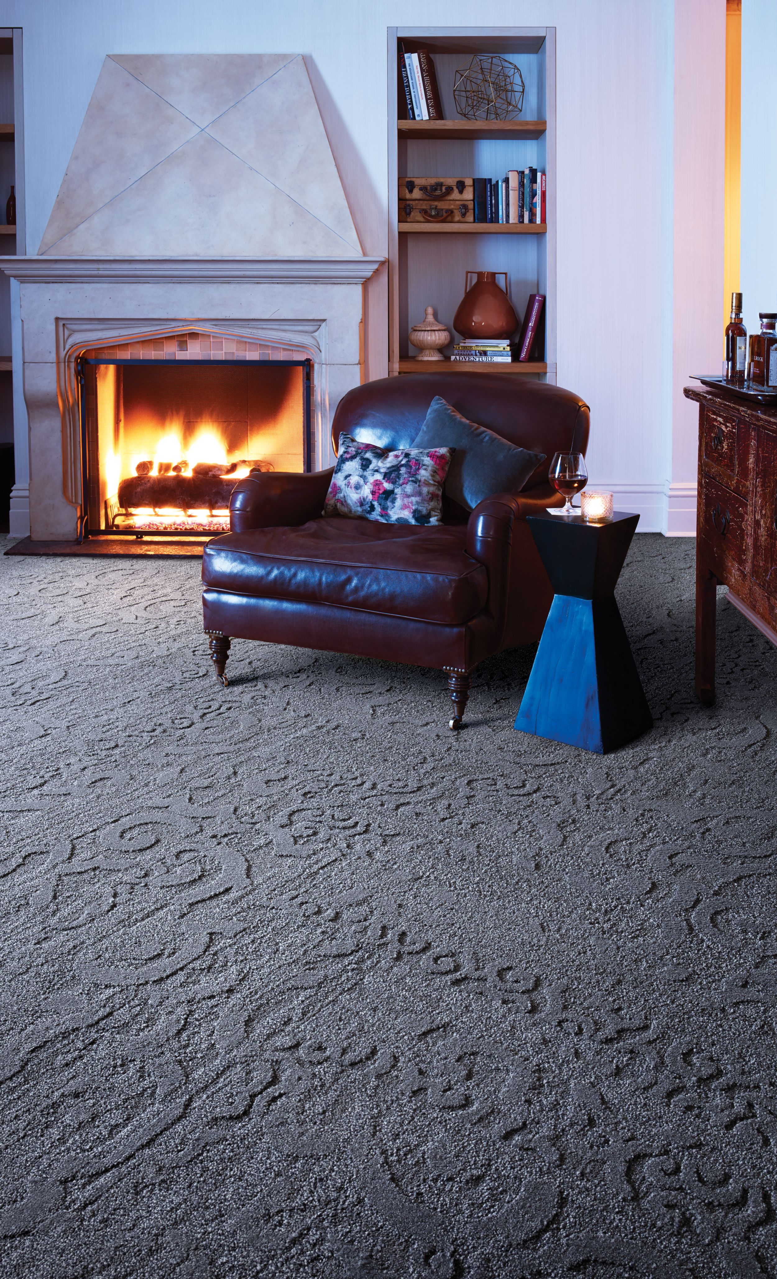 Interface NS230 carpet tile in room with fireplace and chair image number 1