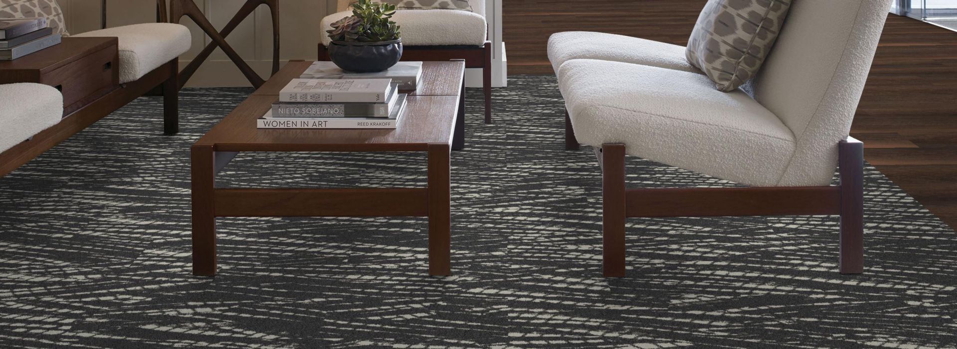 Interface Artist Proof plank carpet tile and Natural Woodgrains LVT in seating area