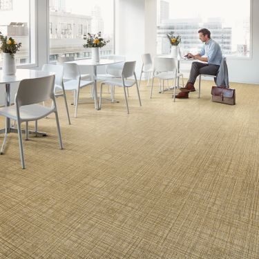 Interface Native Fabric LVT in office common area with tables and chairs image number 1