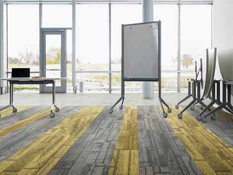 Interface Neighborhood Blocks plank carpet tile and Textured Stones LVT in entryway of public space with whiteboard and folding tables imagen número 2