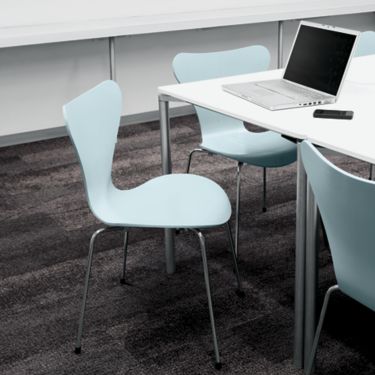 Interface Neighborhood Smooth plank carpet tile in meeting room or classroom with laptop and light blue chairs