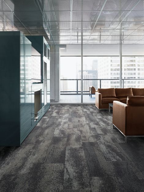 Interface Neighborhood Smooth plank carpet tile in residential public space with brown couches and glass walls image number 6