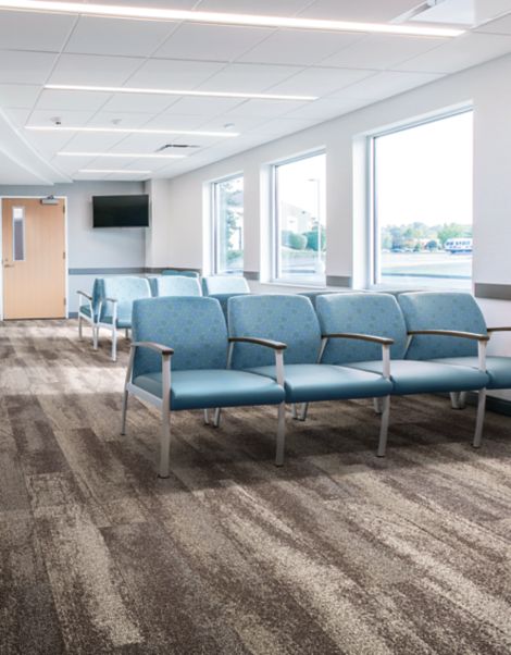 Interface Neighborhood Smooth plank carpet tile in waiting room with blue chairs imagen número 8